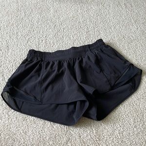 Lululemon Hotty Hot shorts low-rise 2.5 in. Color is black.